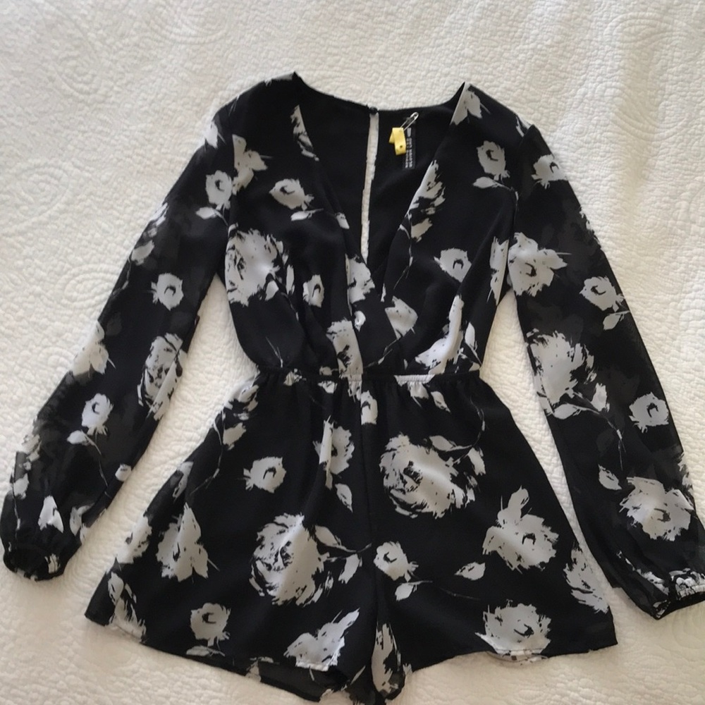 Long sleeve romper worn once and dry cleaned